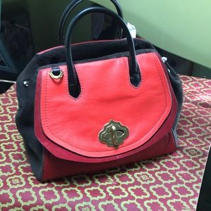 orYany Leather satchel bag. Never used. 12x10x8”